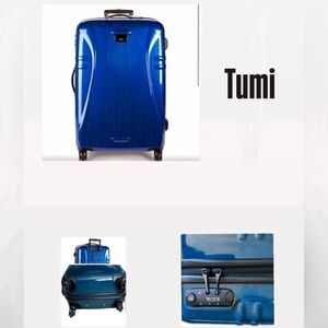 Tumi Blue Hard Shell Suitcase